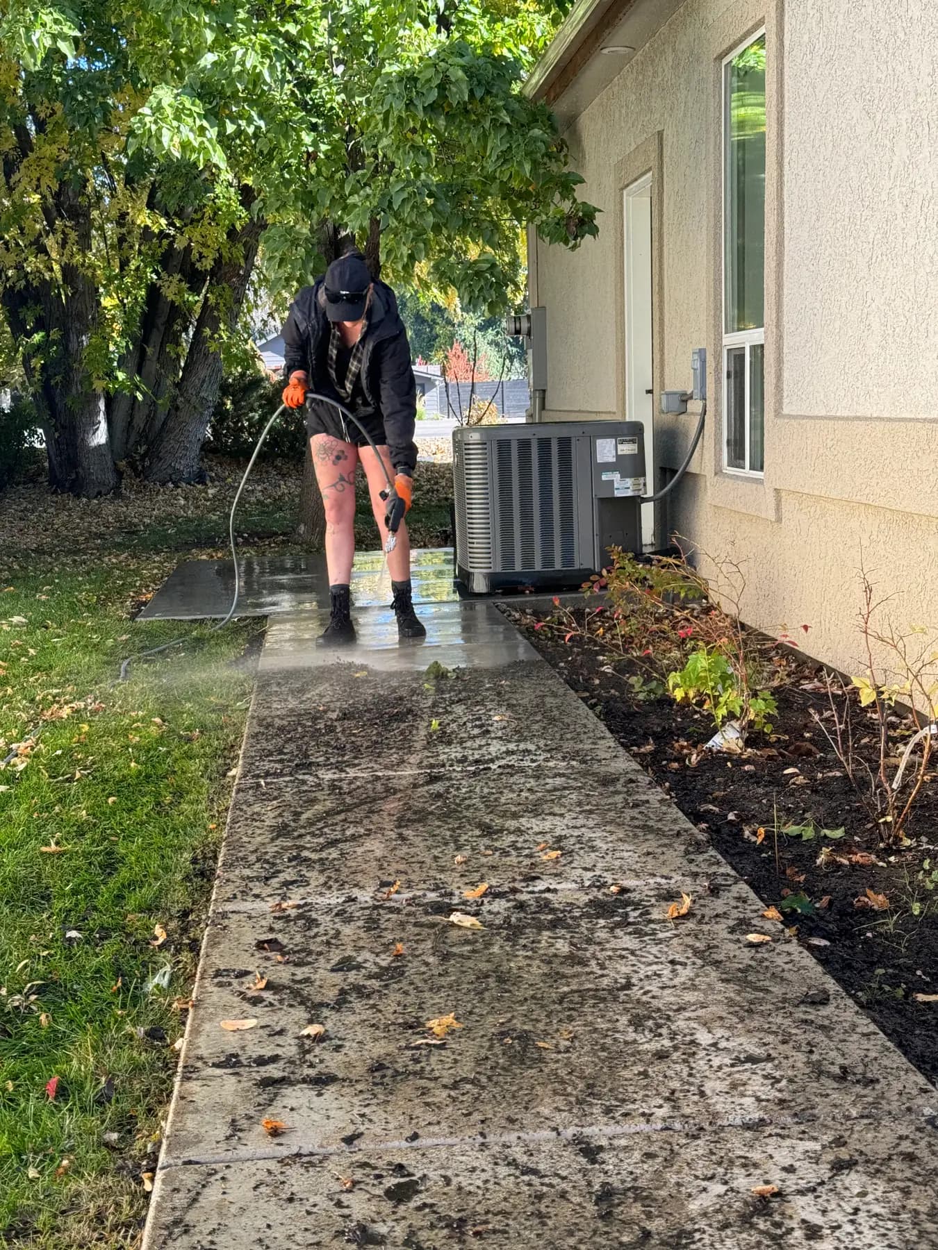 Sidewalk pressure washing in progress — Caldwell, Idaho service area