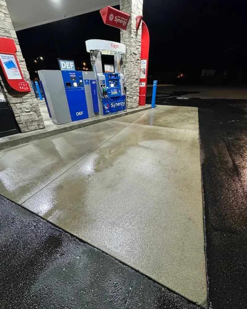 Gas station concrete pad after pressure washing