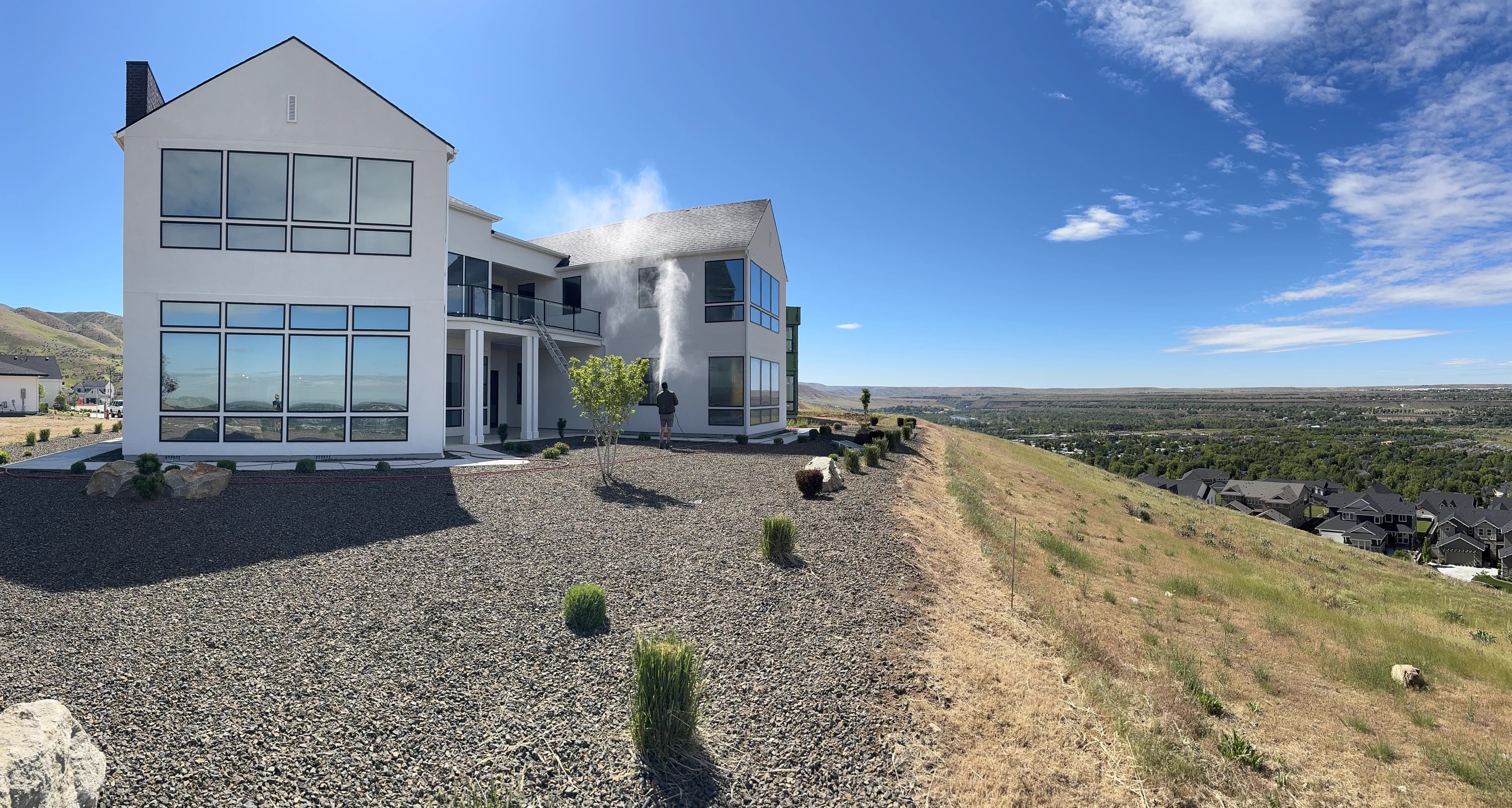 Luxury two-story home exterior pressure washing