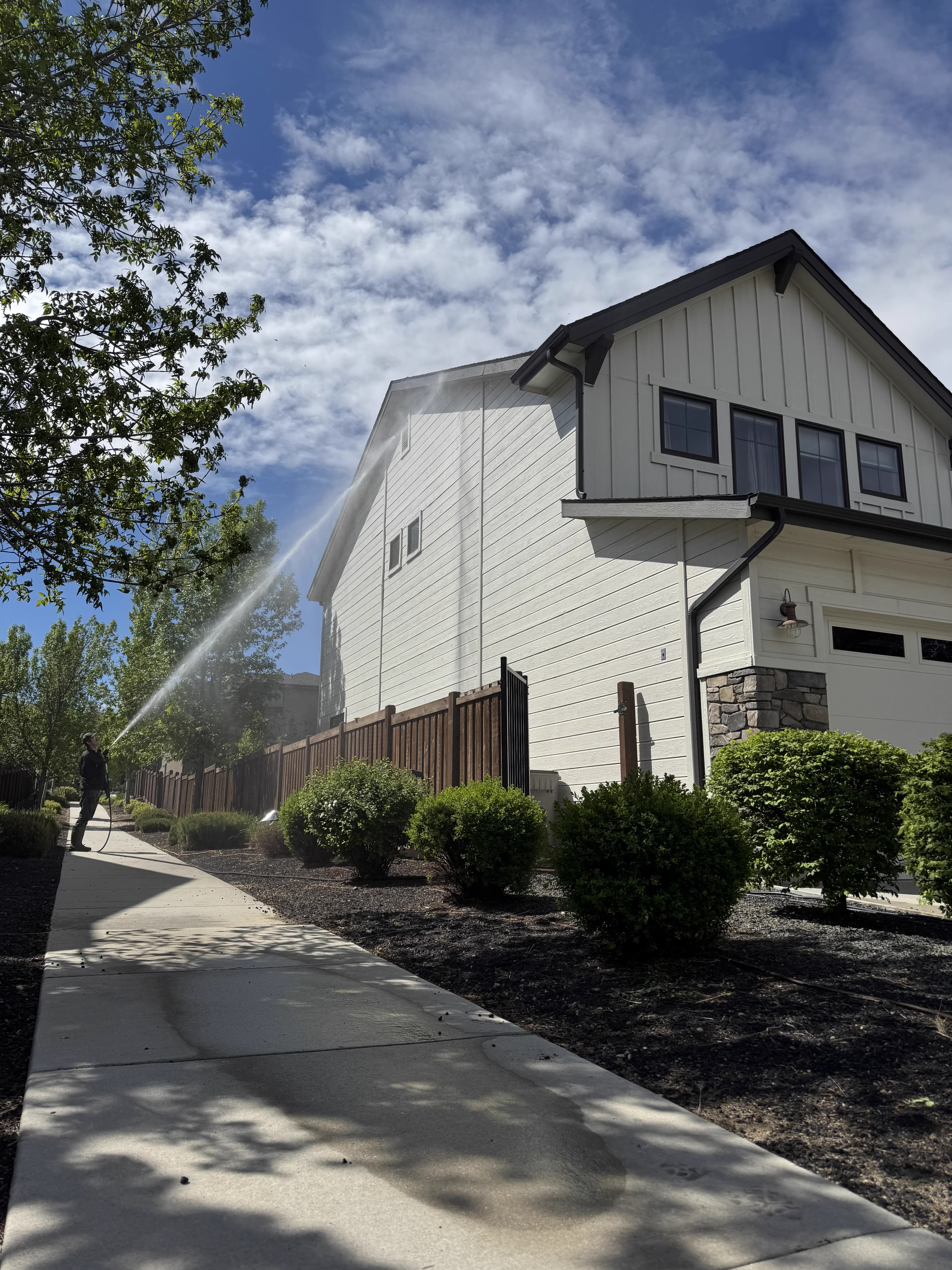 Two-story home exterior soft wash in Boise